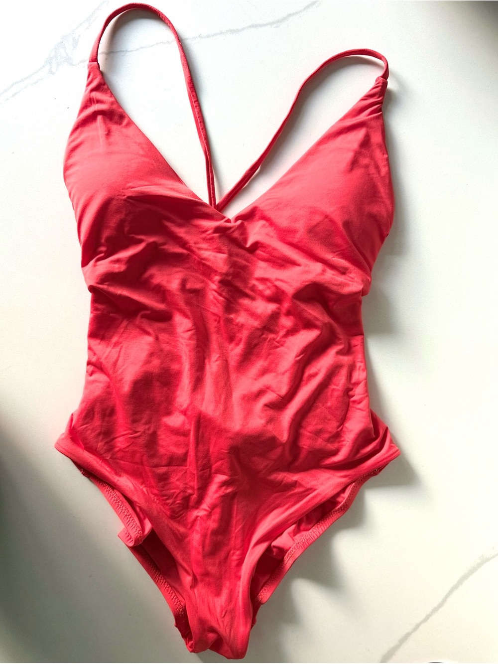 Trina Turk Red V-Neck One-Piece Swimsuit with back details.